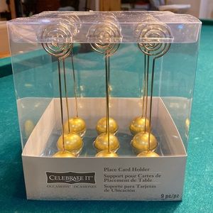 Celebrate It.  9 piece gold place card holders.  Never used.